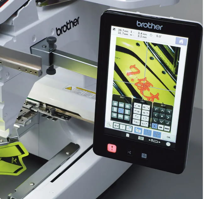 Camera function on embroidery machine shows design position